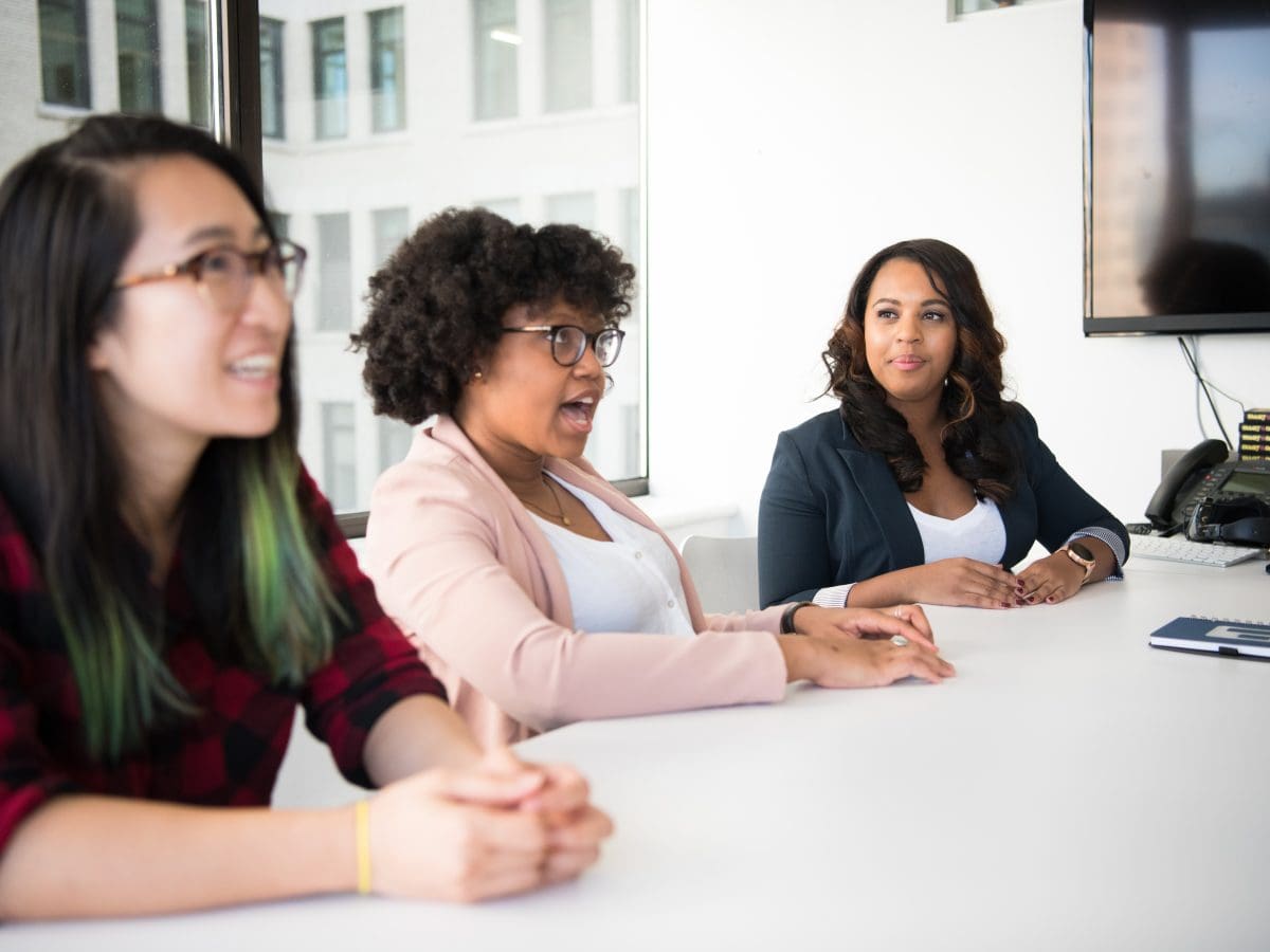 diverse women in meeting